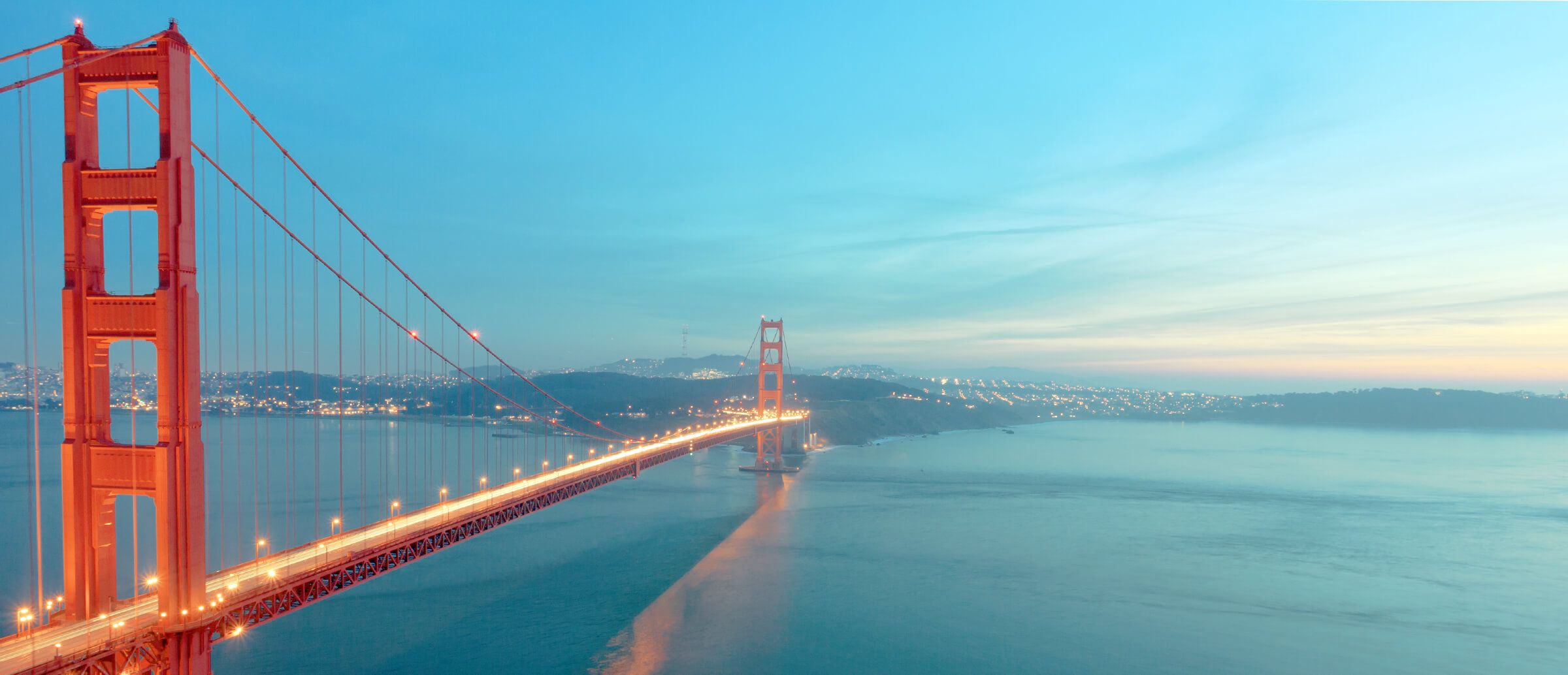 Golden Gate Bridge emerging through fog